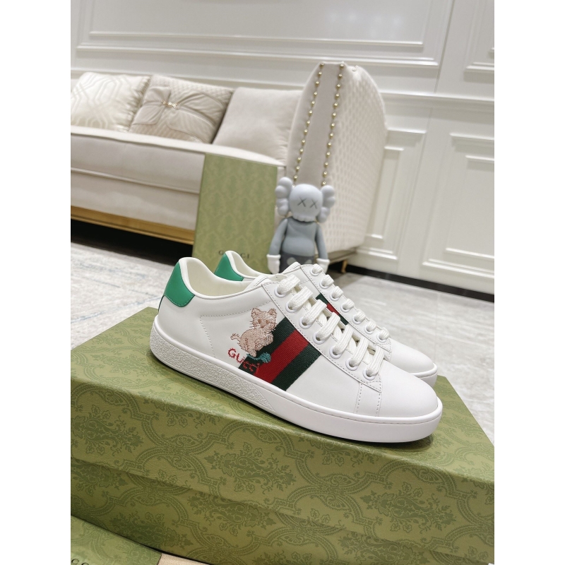 G*u*i sneakers